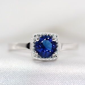 Elegant Silver and Blue Gemstone Ring